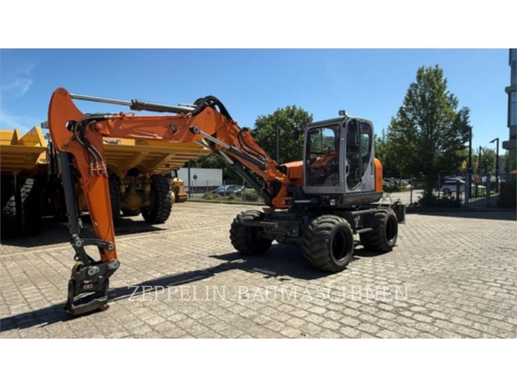 Wacker EW100 Ekskavatori uz riteņiem