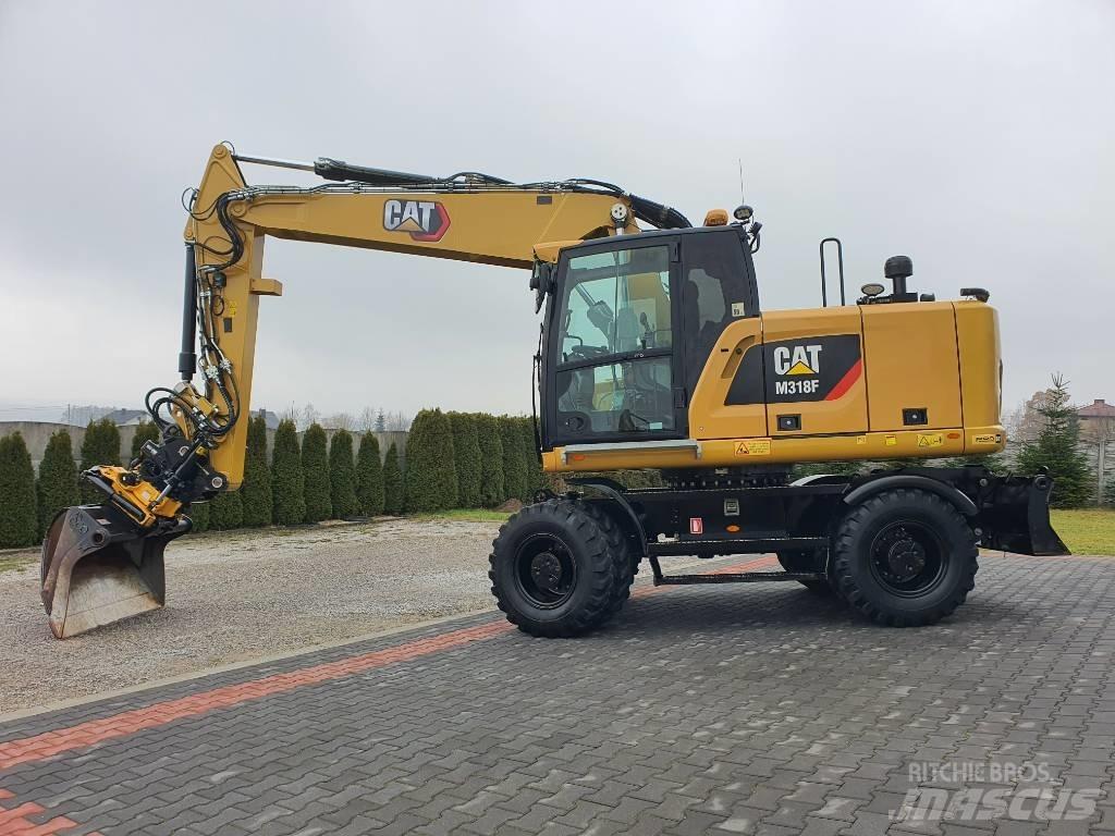CAT M 318 F Ekskavatori uz riteņiem