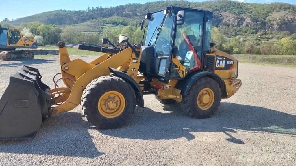 CAT 906 Iekrāvēji uz riteņiem