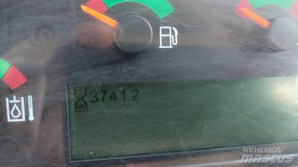CAT 906 Iekrāvēji uz riteņiem