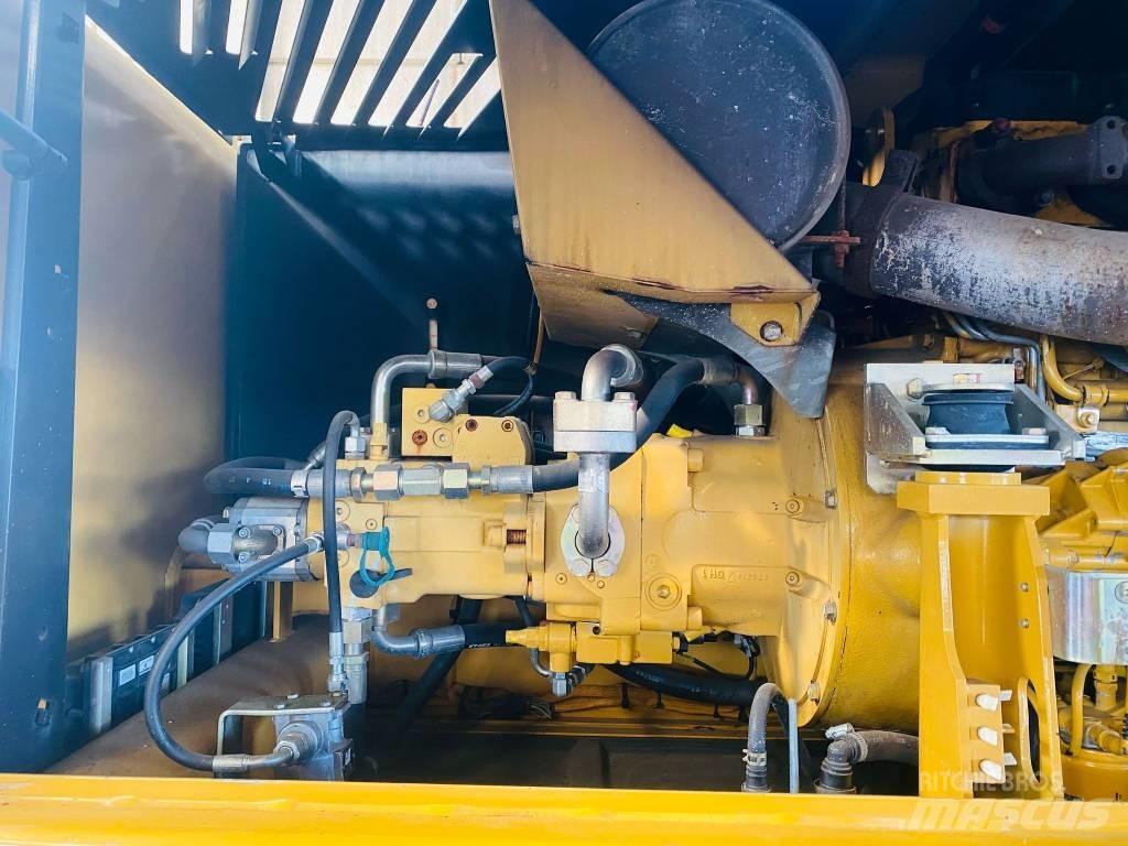 CAT M 318 D Ekskavatori uz riteņiem