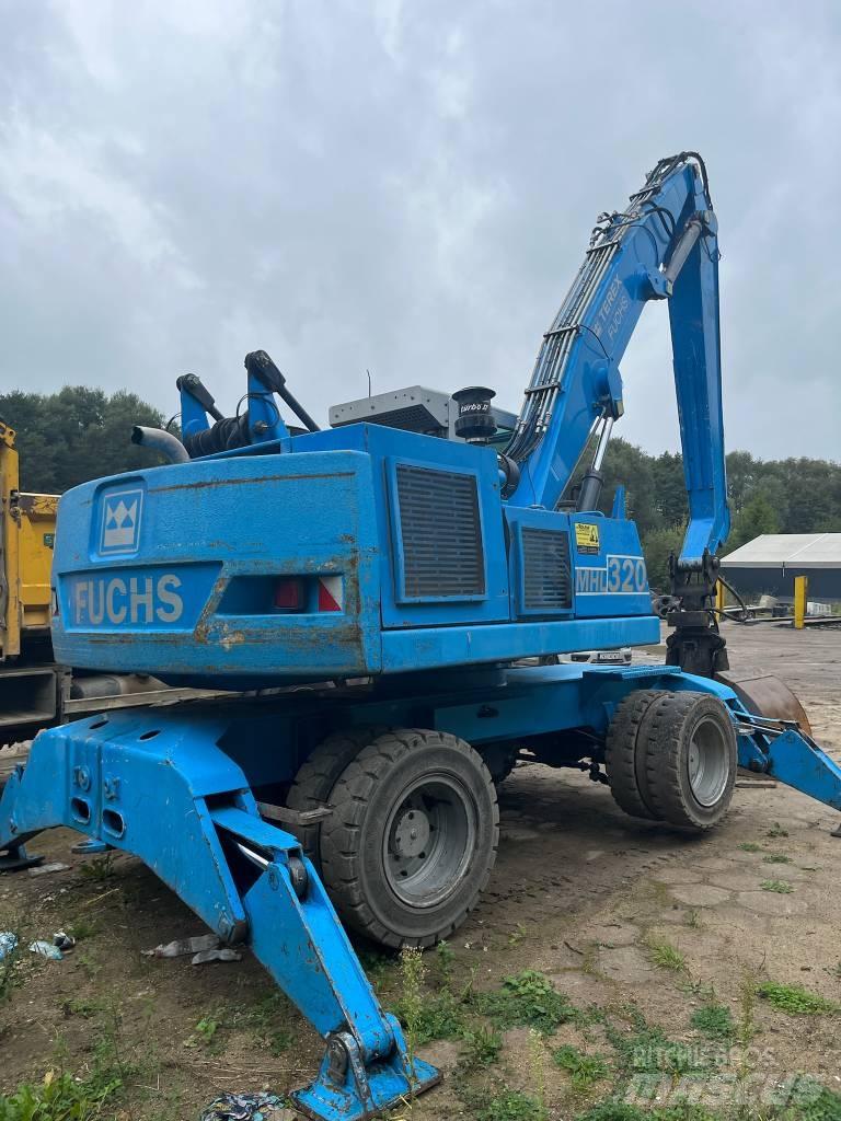 Fuchs MHL 320 Ekskavatori uz riteņiem