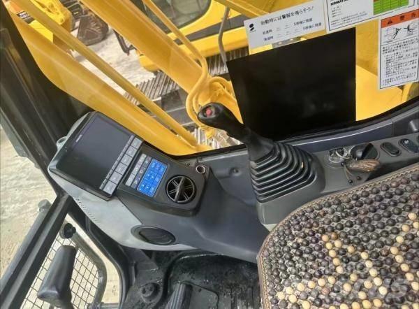 Komatsu PC 200 Vidēja lieluma ekskavatori 7 t - 12 t
