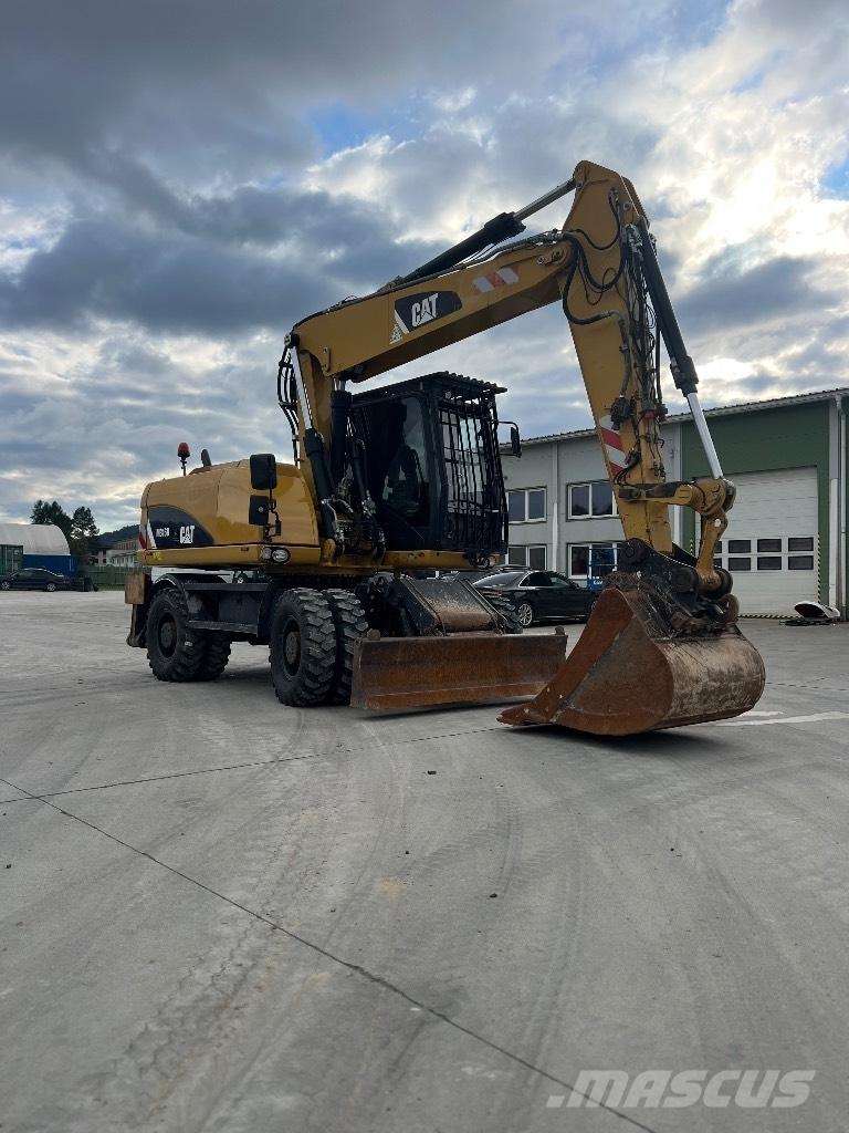 CAT M 316 D Ekskavatori uz riteņiem
