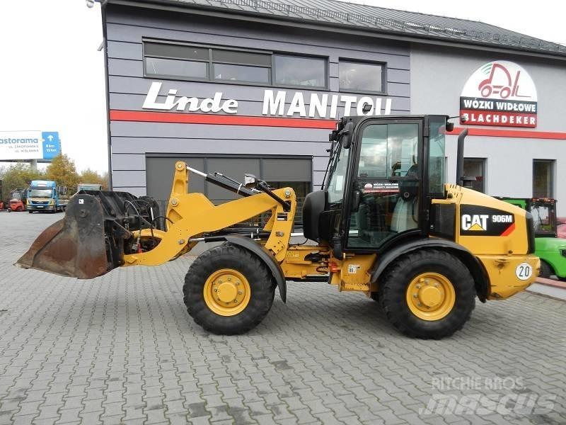 CAT 906M Iekrāvēji uz riteņiem