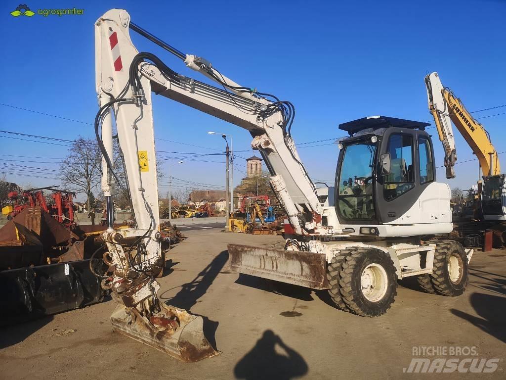 CASE WX 125 Ekskavatori uz riteņiem
