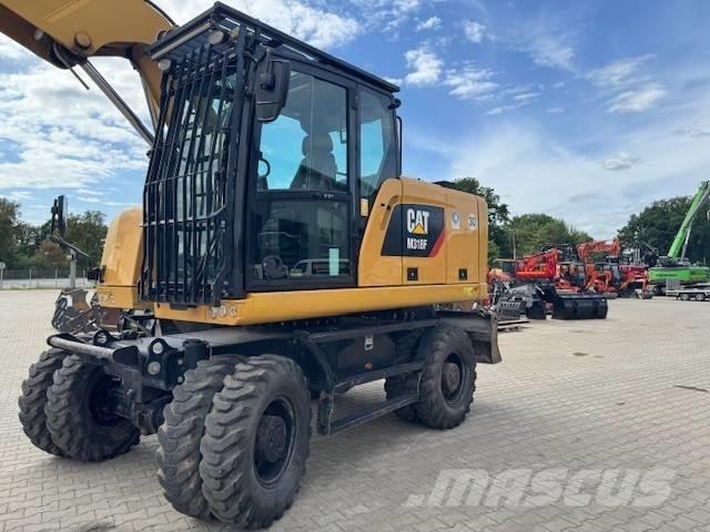 CAT M 318 F Ekskavatori uz riteņiem