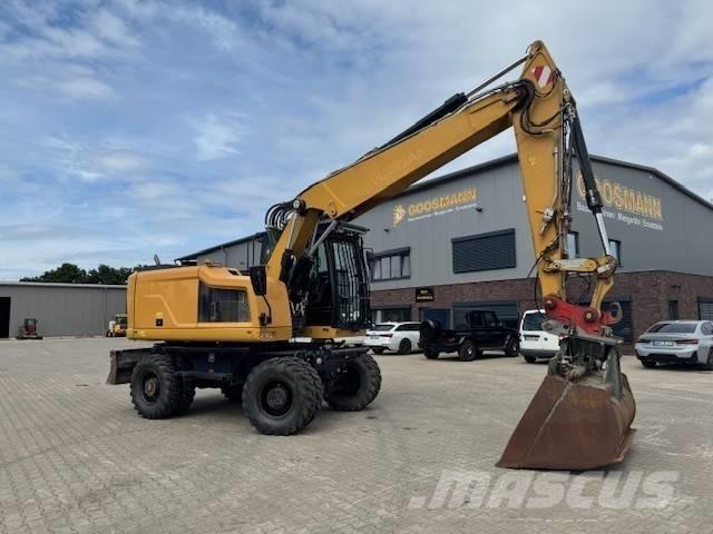 CAT M 318 F Ekskavatori uz riteņiem