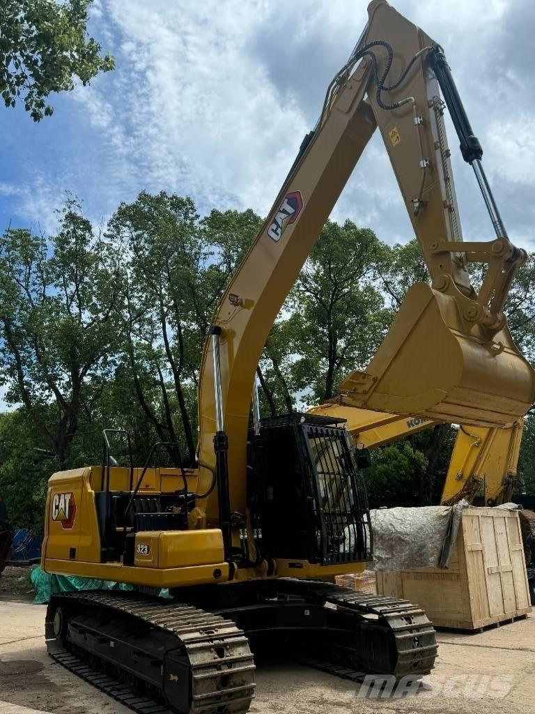 CAT 323 Vidēja lieluma ekskavatori 7 t - 12 t