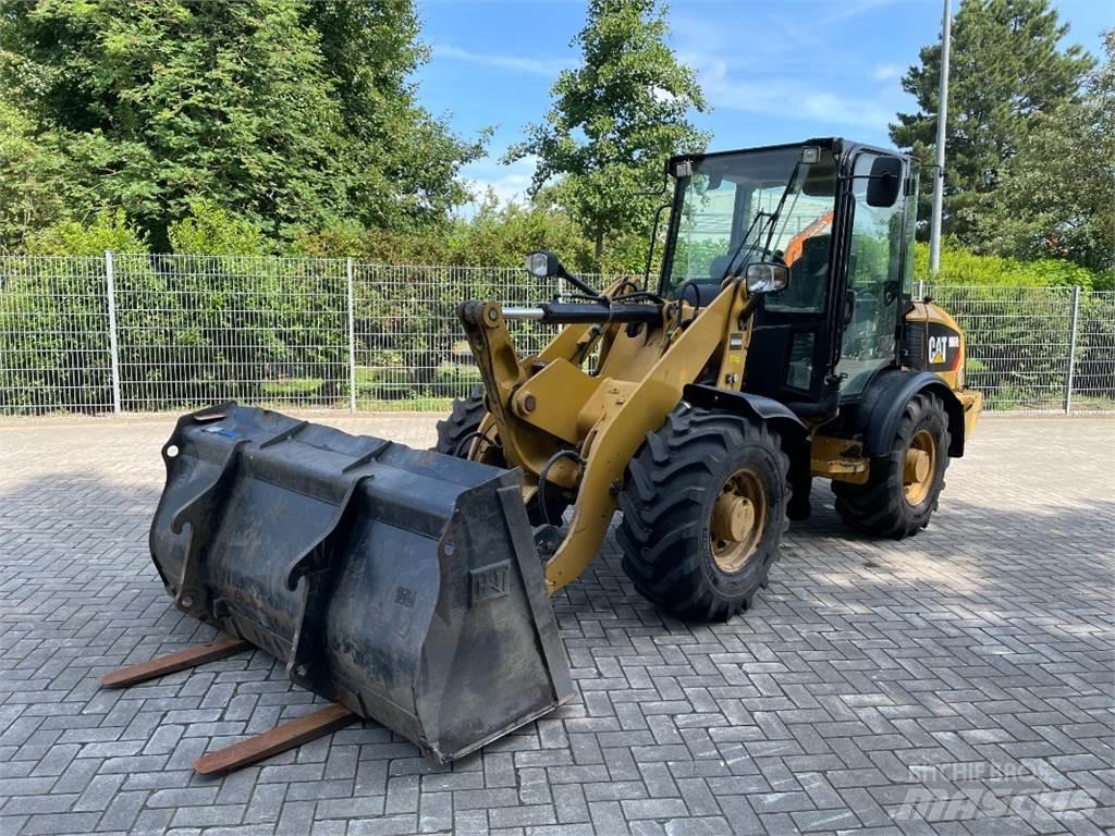 CAT 906H2 Iekrāvēji uz riteņiem
