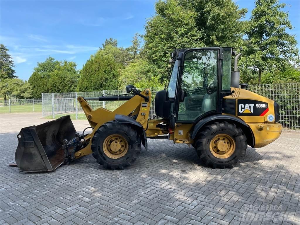 CAT 906H2 Iekrāvēji uz riteņiem