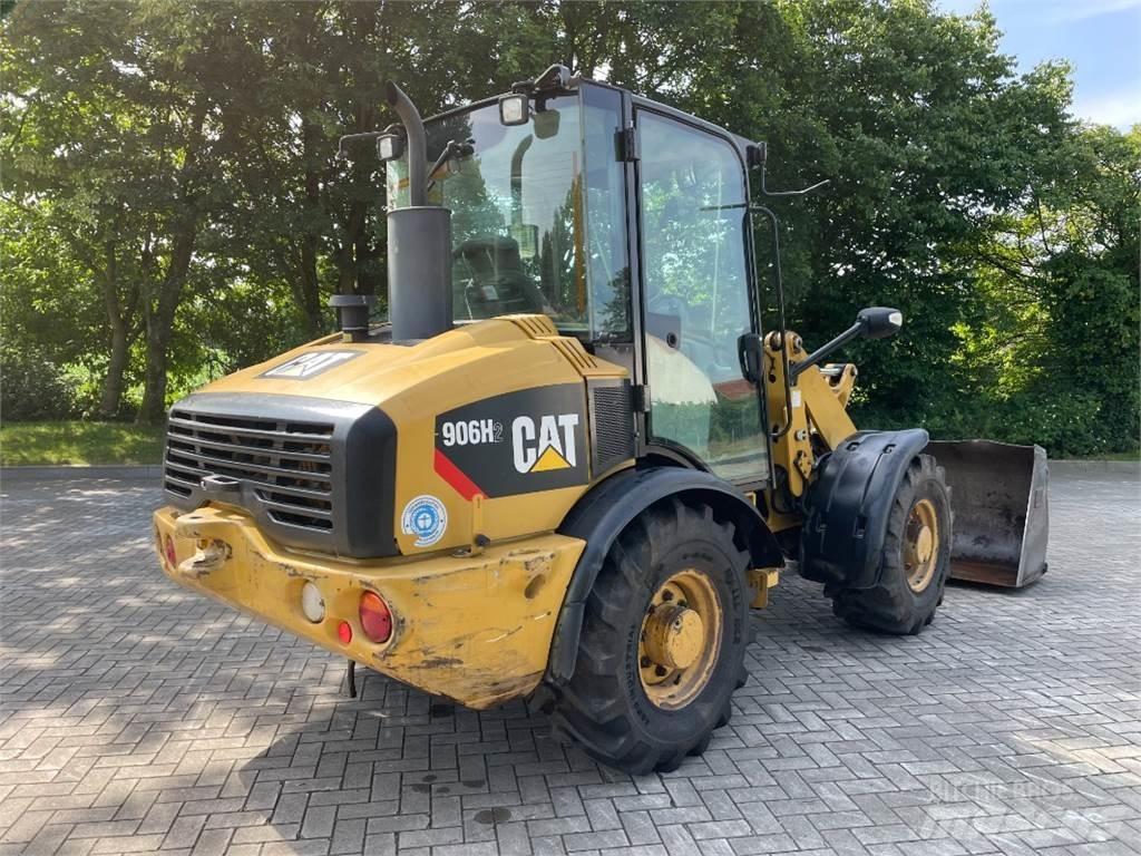 CAT 906H2 Iekrāvēji uz riteņiem
