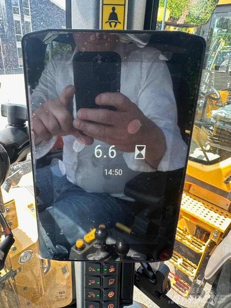 CAT 938 Iekrāvēji uz riteņiem