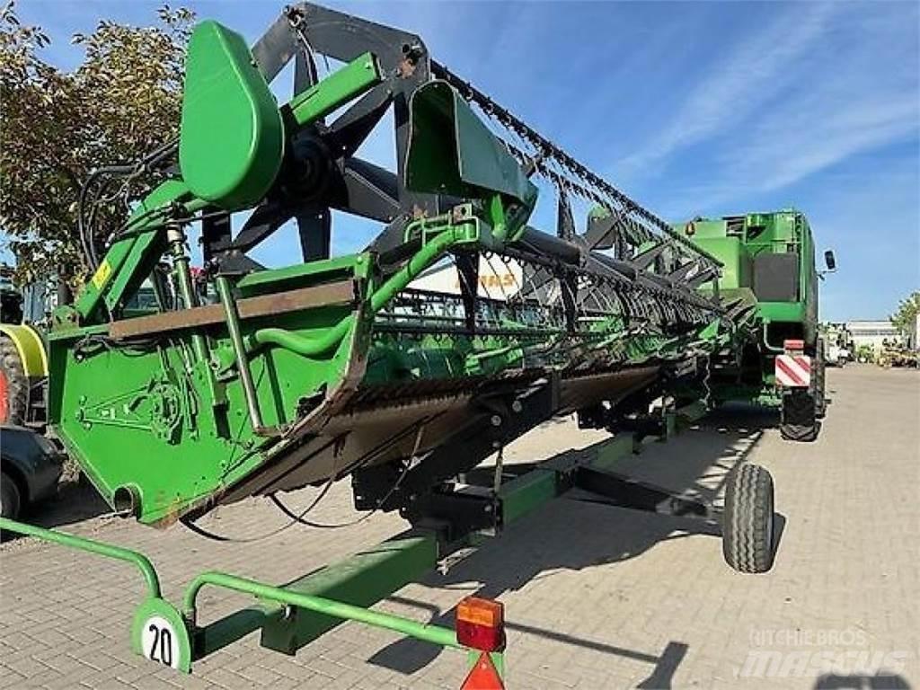 John Deere W550 Ražas novākšanas kombaini