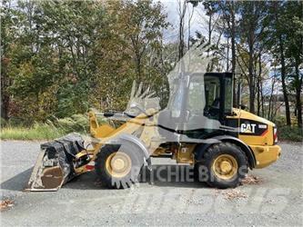 CAT 906M Iekrāvēji uz riteņiem