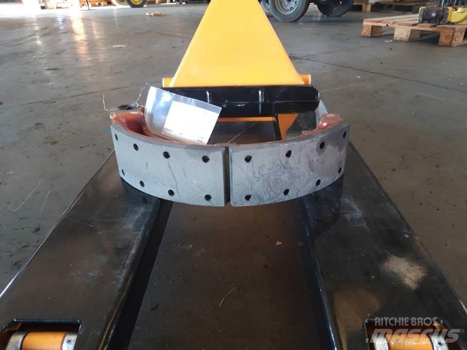 CAT 966C Sliedes, ķēdes un šasija