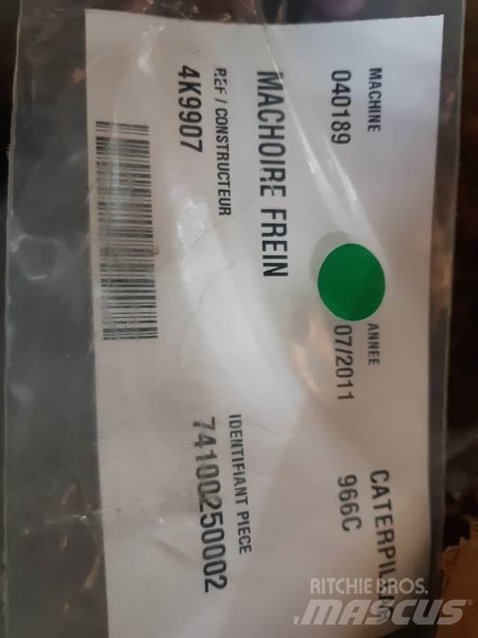 CAT 966C Sliedes, ķēdes un šasija