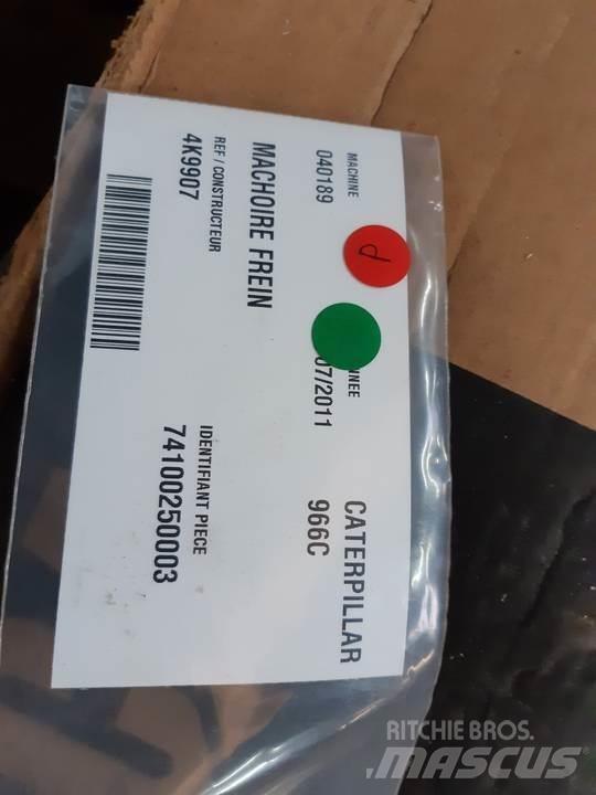 CAT 966C Sliedes, ķēdes un šasija