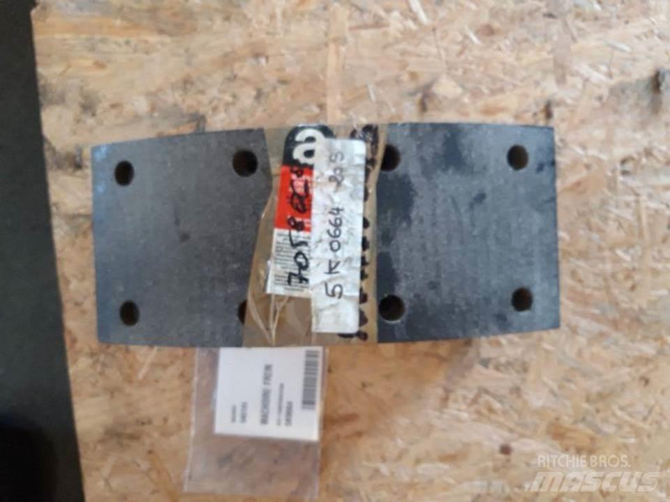 CAT 966C Sliedes, ķēdes un šasija