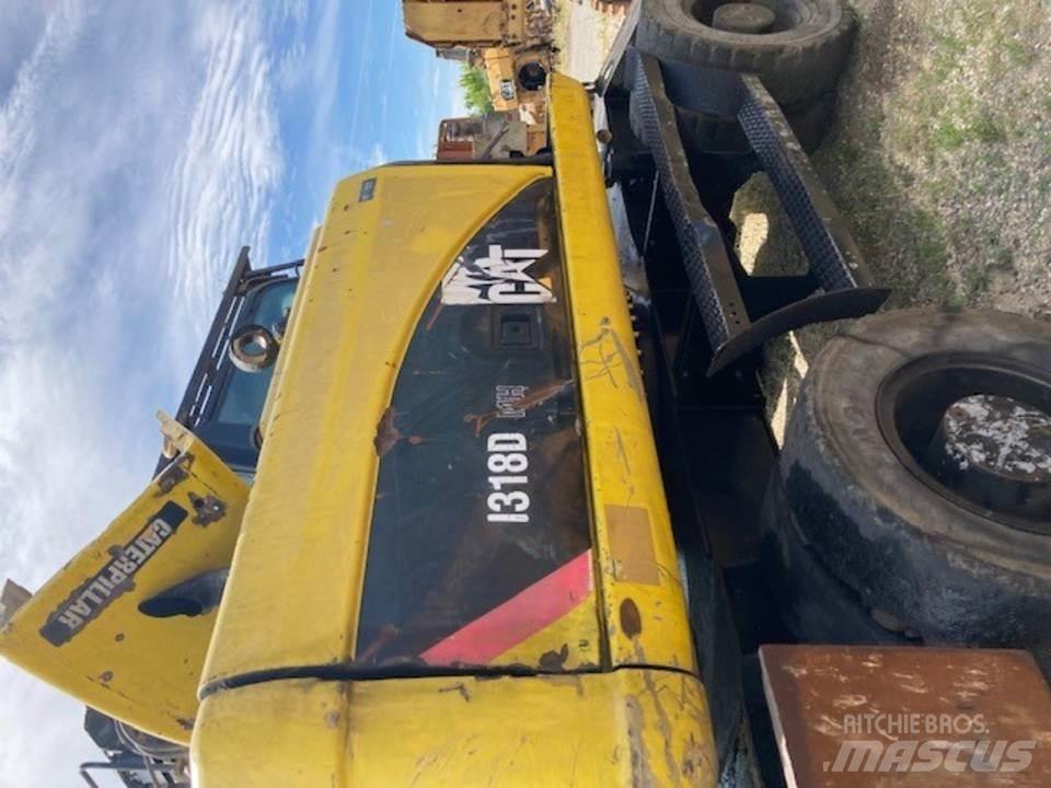 CAT M318D Kabīnes un interjers