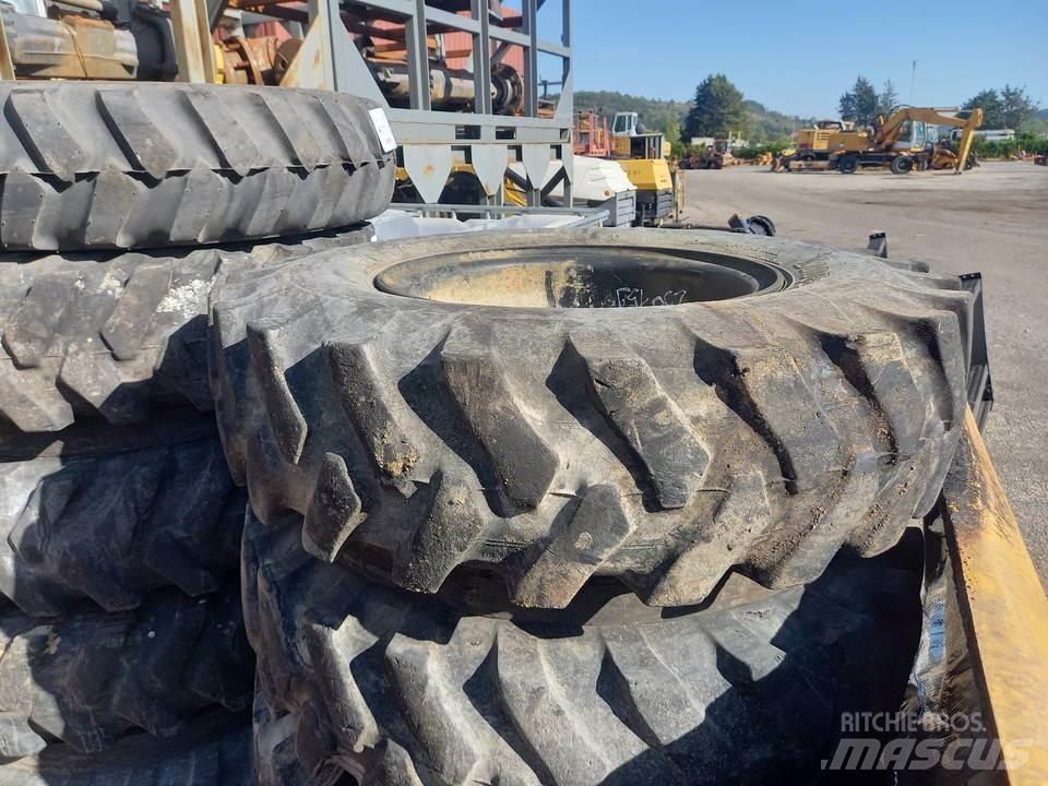 CAT M320F Sliedes, ķēdes un šasija