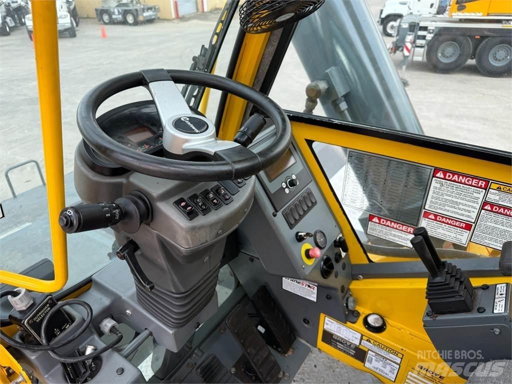 Grove RT880E Celtņi nelīdzenām virsmām