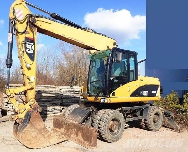 CAT M 315 D Ekskavatori uz riteņiem