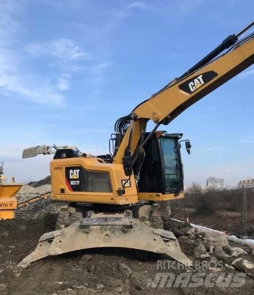 CAT M317 F Ekskavatori uz riteņiem