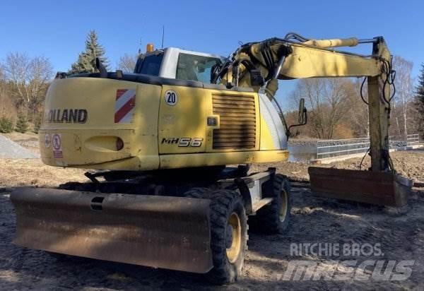 New Holland MH 5.6 Ekskavatori uz riteņiem