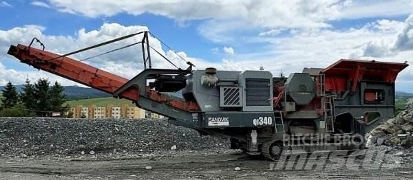 Sandvik QJ 340 Drupinātāji