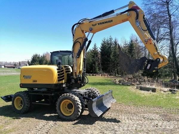 Yanmar B110 W Style Ekskavatori uz riteņiem