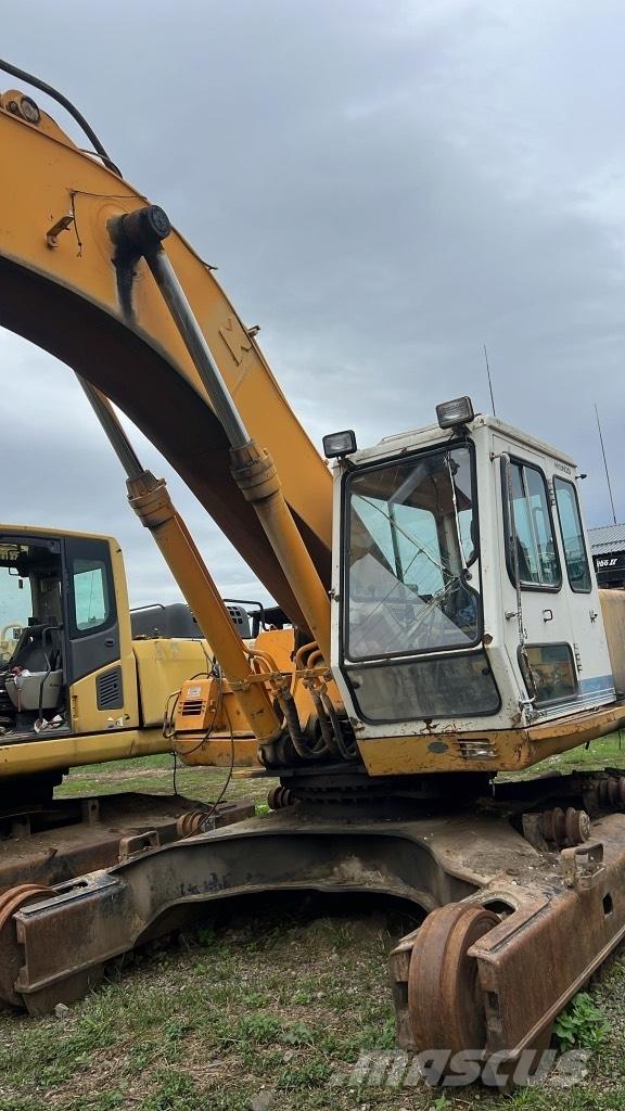 Hyundai Robex 320 LC Sliedes, ķēdes un šasija
