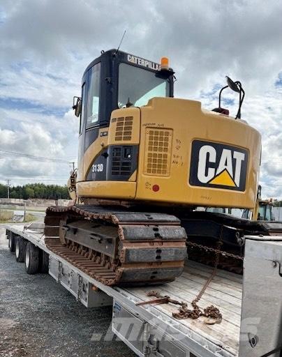 CAT 313 D Ekskavatori uz riteņiem
