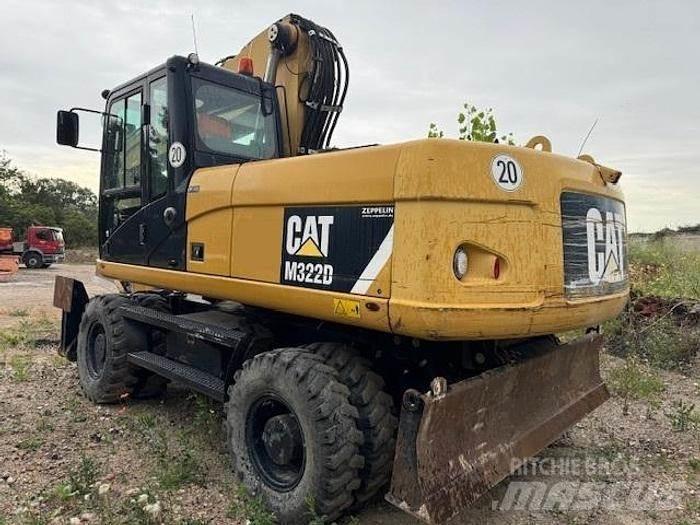 CAT M 322 D Ekskavatori uz riteņiem