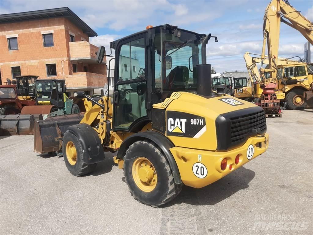 CAT 907H Iekrāvēji uz riteņiem