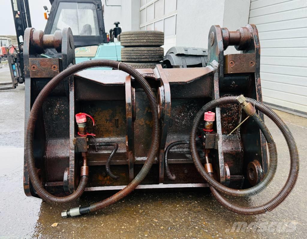  Schnellwechsler 1 Ekskavatori uz riteņiem