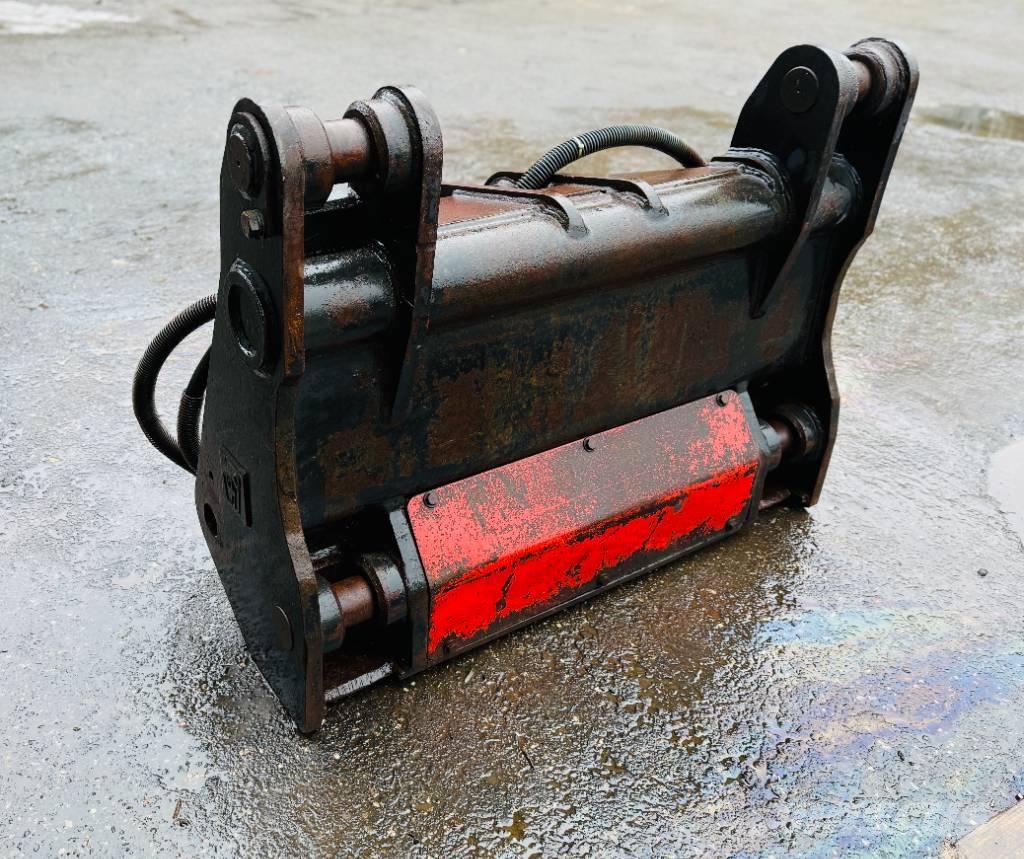  Schnellwechsler 1 Ekskavatori uz riteņiem