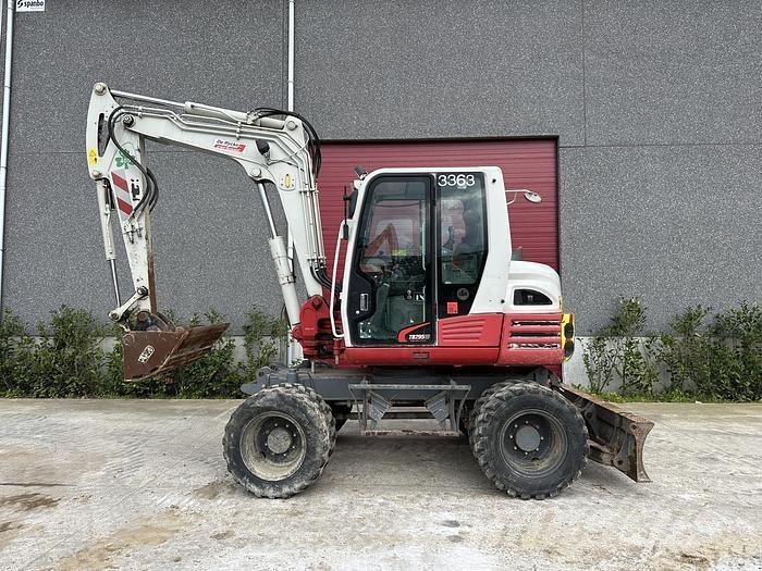 Takeuchi TB295W Ekskavatori uz riteņiem