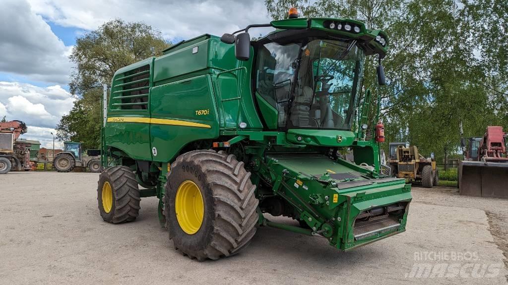 John Deere T 670 i Ražas novākšanas kombaini