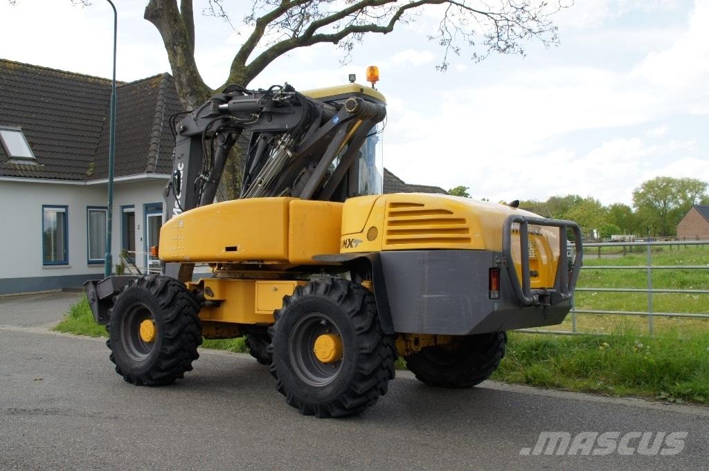 Mecalac 12 MXT Ekskavatori uz riteņiem