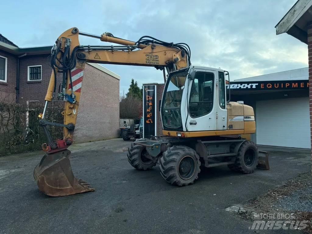 Liebherr A312 Ekskavatori uz riteņiem