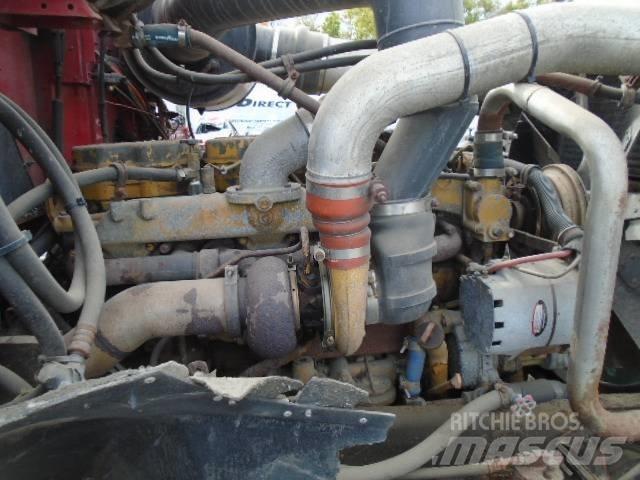 International 9300 Evakuators ar manipulatoru