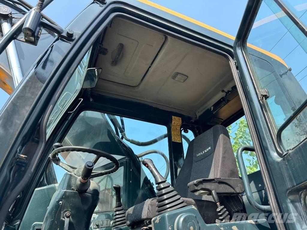 Hyundai 210W-9 Ekskavatori uz riteņiem