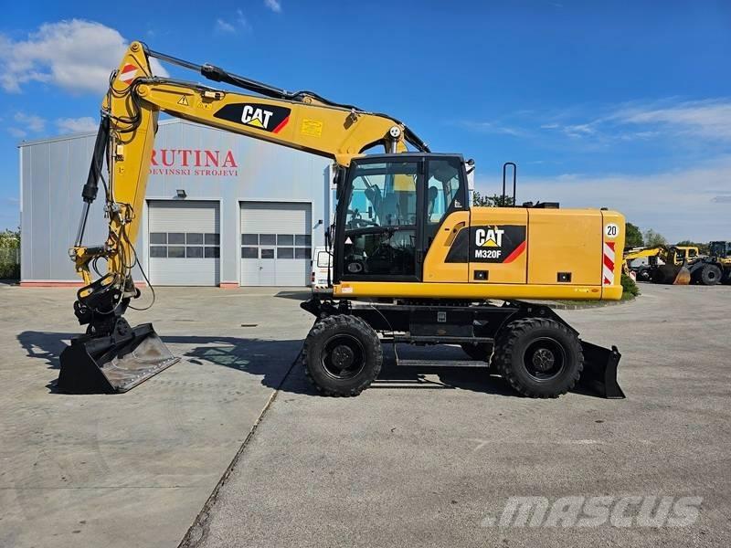 CAT M320F Ekskavatori uz riteņiem