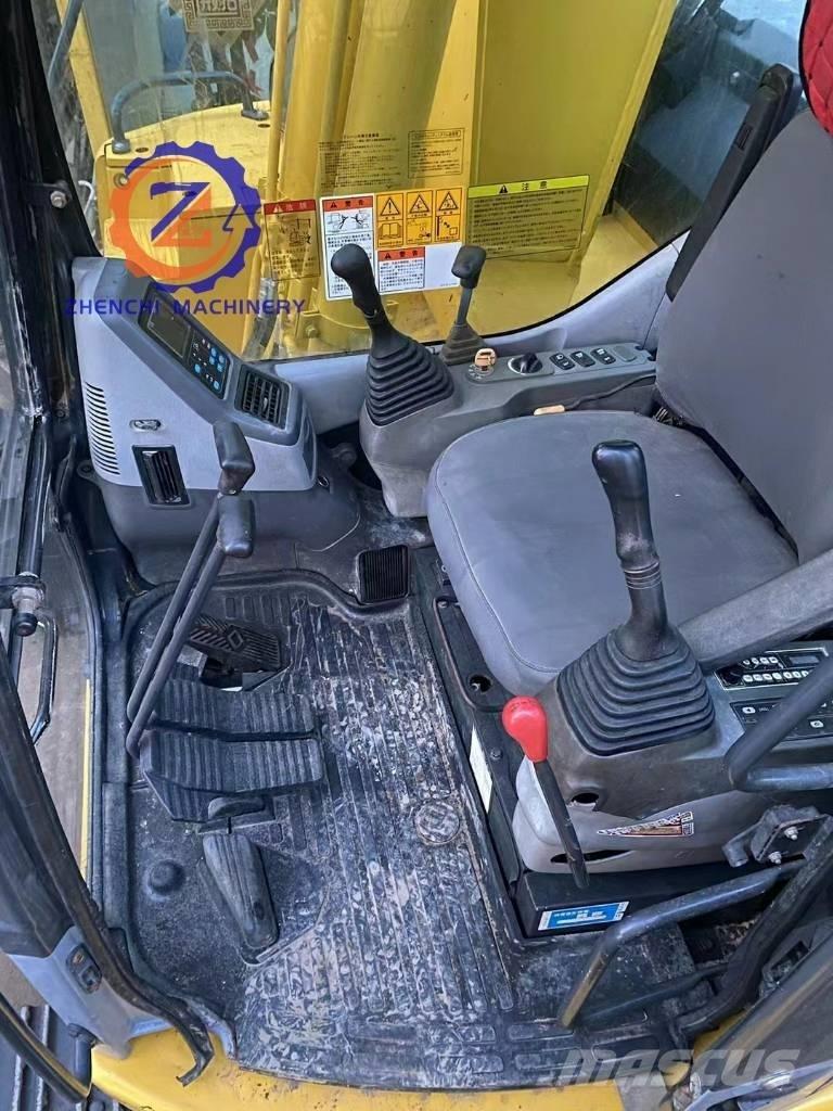 Komatsu PC 128 US Vidēja lieluma ekskavatori 7 t - 12 t