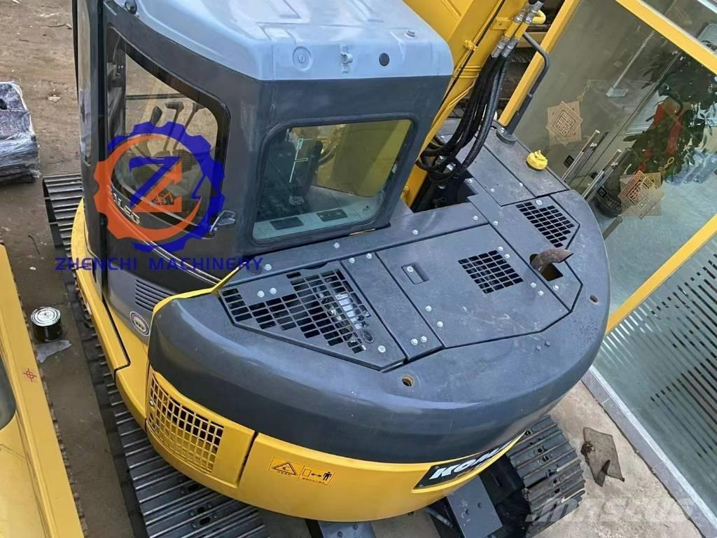 Komatsu PC 128 US Vidēja lieluma ekskavatori 7 t - 12 t