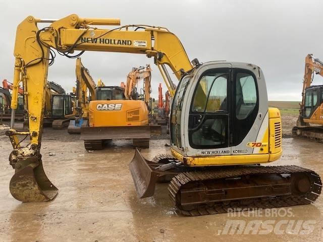 New Holland E 70 SR Vidēja lieluma ekskavatori 7 t - 12 t
