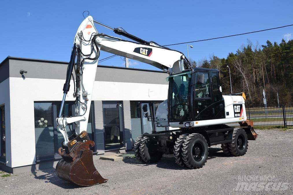 CAT M 313 D Ekskavatori uz riteņiem