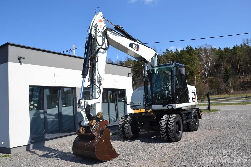 CAT M 313 D Ekskavatori uz riteņiem