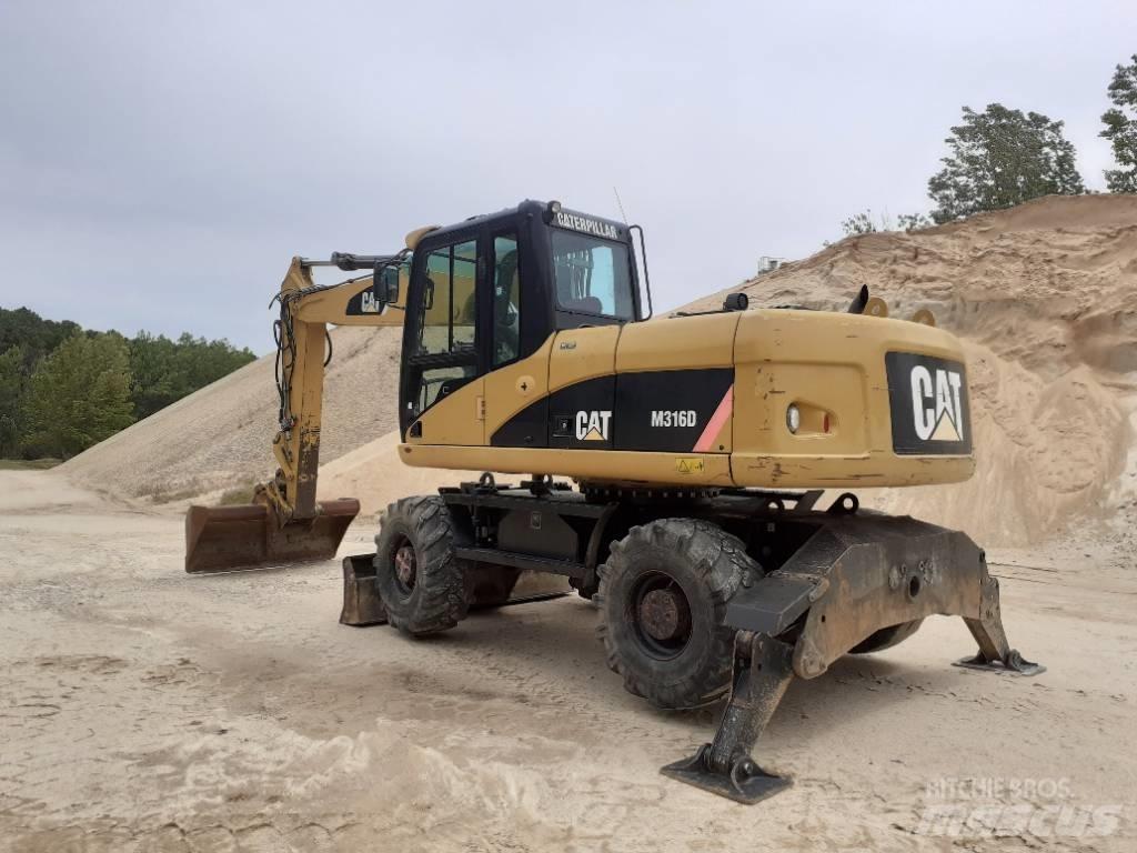 CAT M 316 D Ekskavatori uz riteņiem